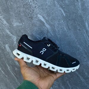 On Running Black and White Athletic Shoes